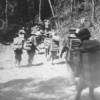 Filipinos carrying supplies to the front
